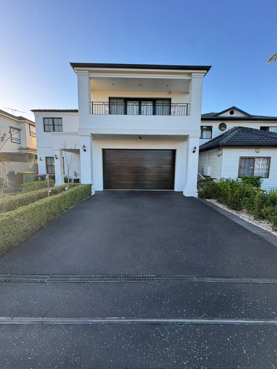 Charcoal spray-crete driveway by Epoxy Flooring NSW