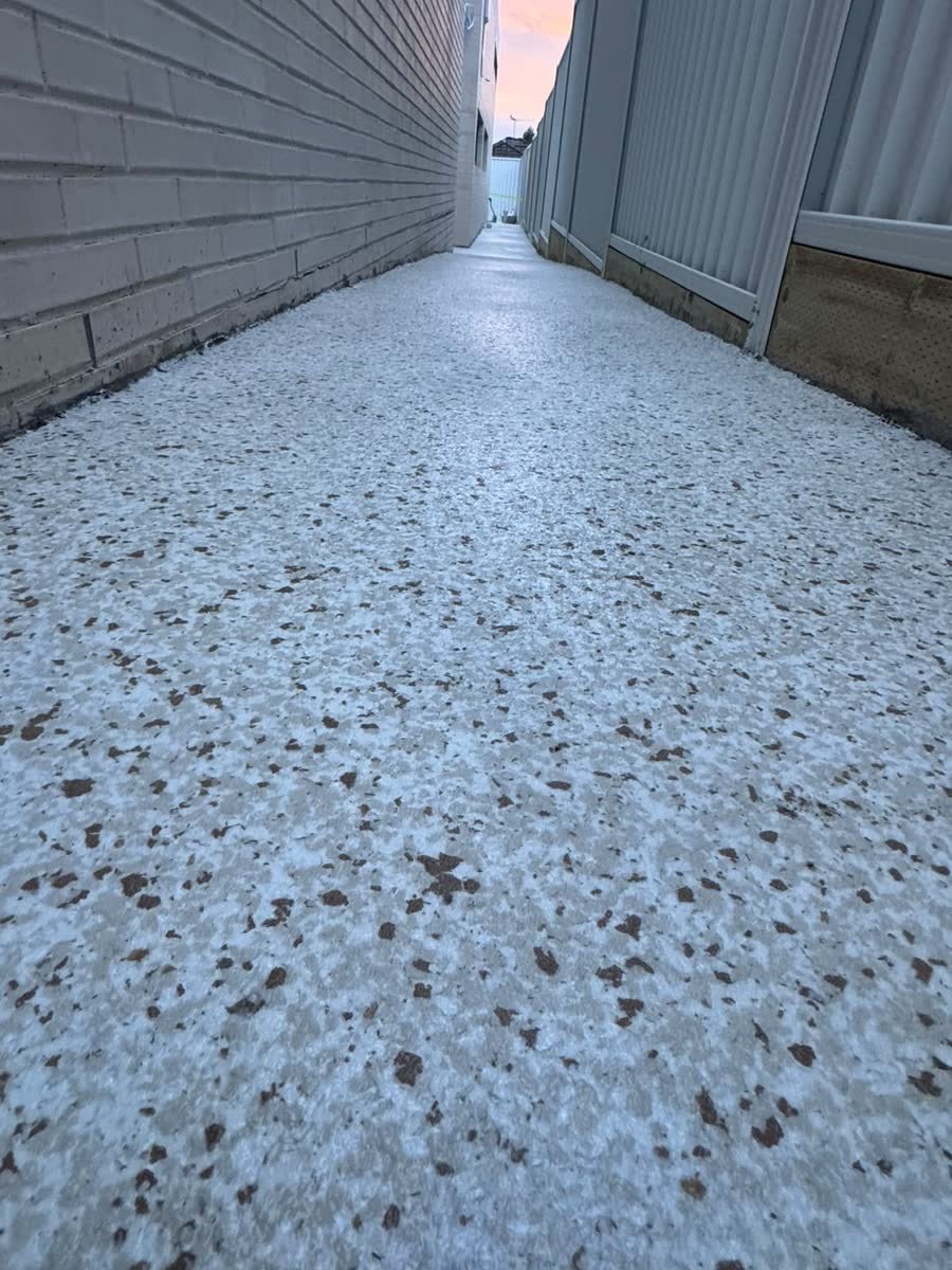 Resurfaced side path in a light finish by Epoxy Flooring NSW