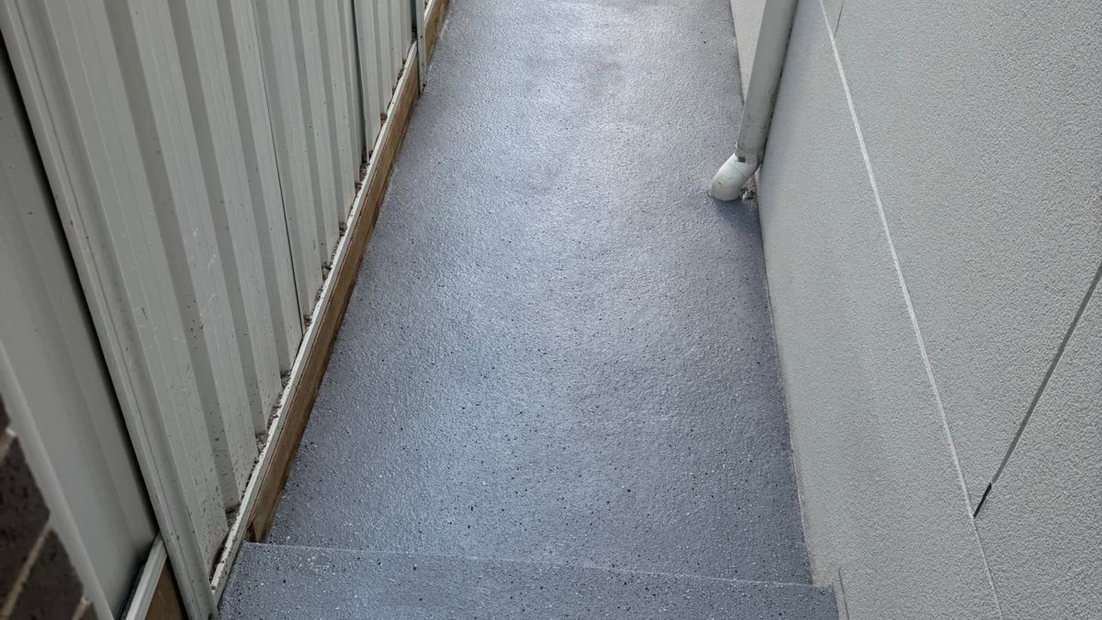 Spray-crete resurfaced outdoor path